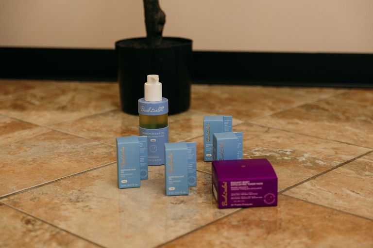 Professional skincare products used in facials at Alpha Chiropractic